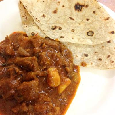 Delicious chapati with chicken curry