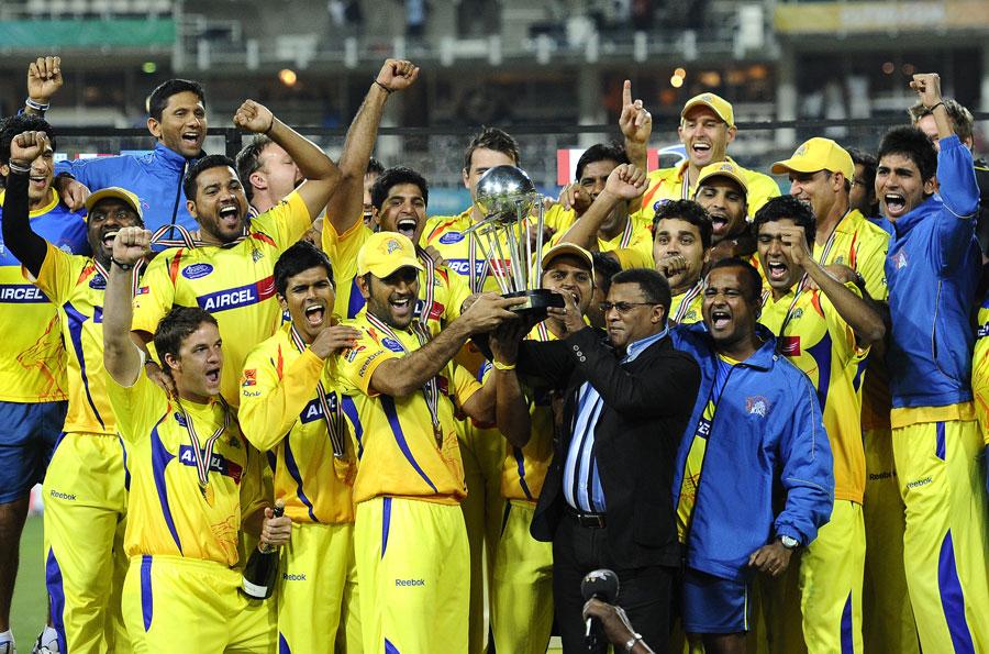 Chennai Super Kings Captain with Champions LeagueT20 trophy
